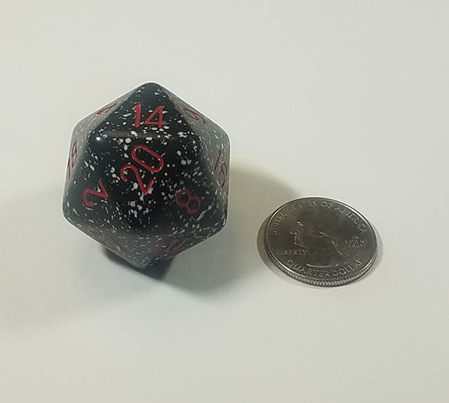 Black and white 34mm d20 with quarter for scale. 