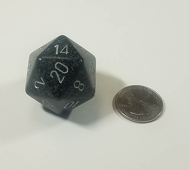 Black and Grey 34mm d20 with quarter for scale. 