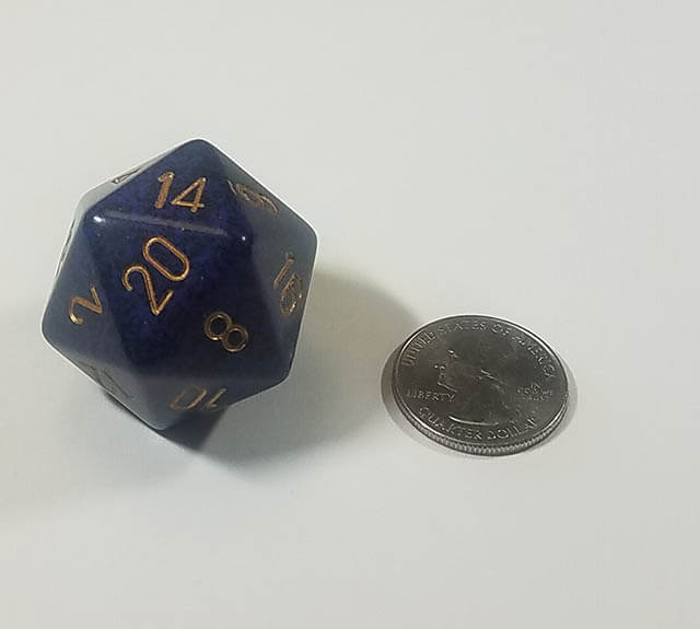 Blue 34mm d20 with quarter for scale. 