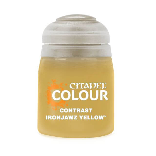 A pot of Citadel Contrast paint in Ironjawz Yellow color, used for model painting.