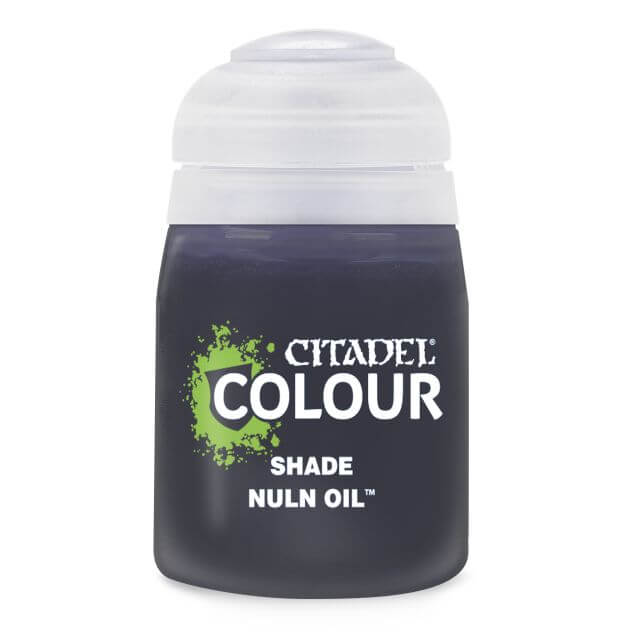 A pot of Citadel Colour Shade Nuln Oil, primarily black in color with green and white accents on the label.