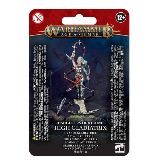 Packaging for Warhammer Age of Sigmar's Daughters of Khaine High Gladiatrix miniature, featuring the assembled and painted figure holding a barbed whip, with alternative heads and weapons options described.