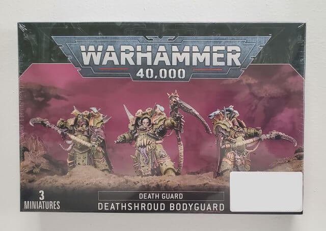 Packaging for Warhammer 40,000 Death Guard Deathshroud Bodyguard miniatures, featuring illustrations of the characters on a box with 'Warhammer 40,000' branding.