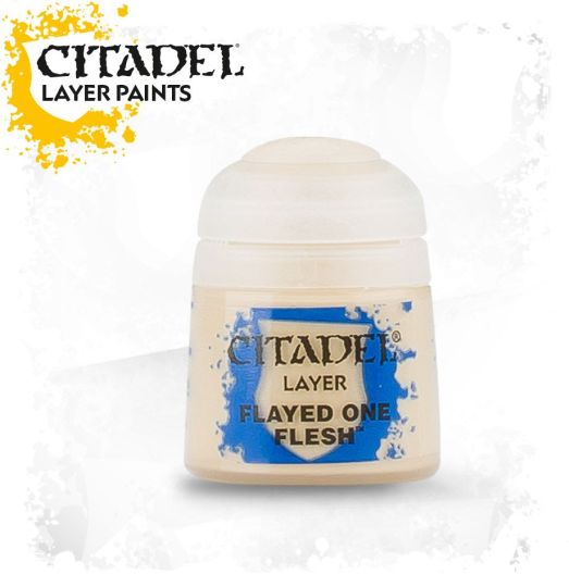 A pot of Citadel Layer paints in the color 'Flayed One Flesh' designed for painting miniatures.
