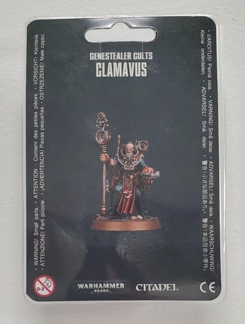 Packaging for Genestealer Cults Clamavus miniature, featuring the model on a black background with the Warhammer logo and Citadel studio branding.
