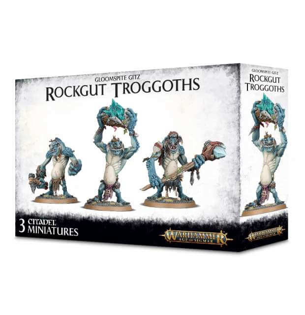 A product packaging for Gloomspite Gitz Rockgut Troggoths miniatures, featuring three figures with various weapons and poses, and component parts laid out on a base.