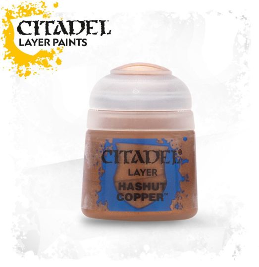 A pot of Citadel Layer paints in the color 'Hashut Copper', primarily used for painting miniatures.