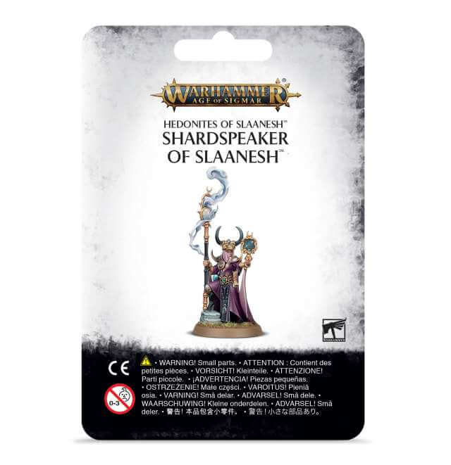 Packaging for 'Hedonites of Slaanesh Shardspeaker of Slaanesh' miniatures game, featuring a dark and moody illustration of a fantasy character with a mask and entwined chains, against a black and grey backdrop with game-related text.
