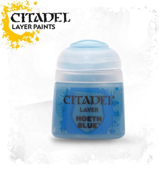 A pot of Citadel Layer Hoeth Blue acrylic paint.
