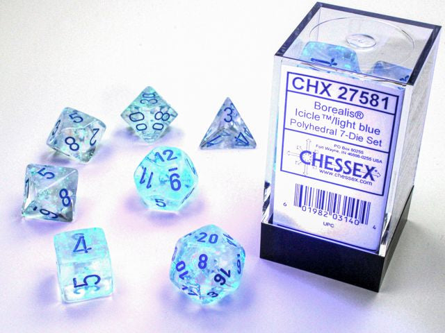 A close up of the Chessex Borealis Icicle with light blue polyhedral set and its' packaging.