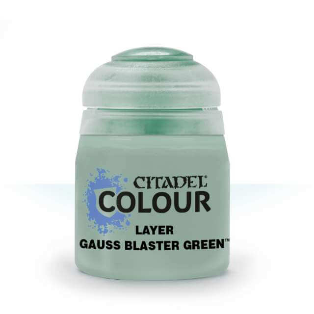 A pot of Citadel layer paint in Gauss Blaster Green color, used for miniature painting.