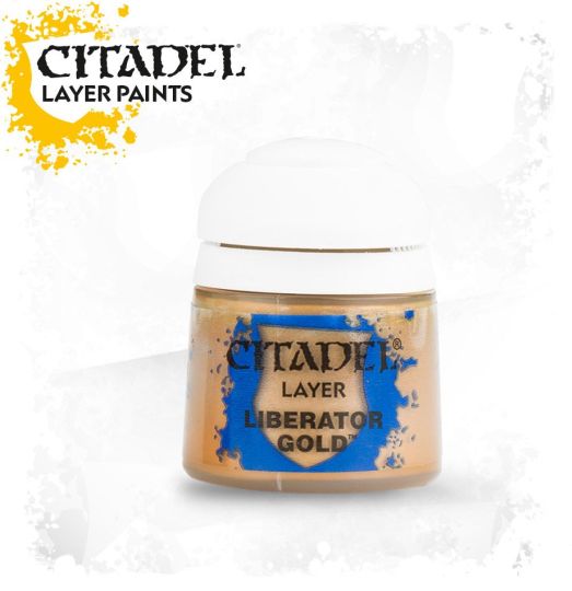 A pot of Citadel Layer paints labeled 'Liberator Gold' with a gold-colored paint visible inside the container.