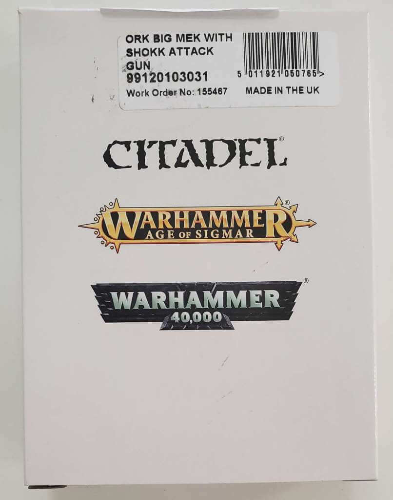 Packaging for 'Ork Big Mek with Shokk Attack Gun' from Citadel's Warhammer 40,000 series. The box is white with 'Citadel' and 'Warhammer 40,000' logos, and it is labeled with the product name and the phrase ' pewter attack gun'.