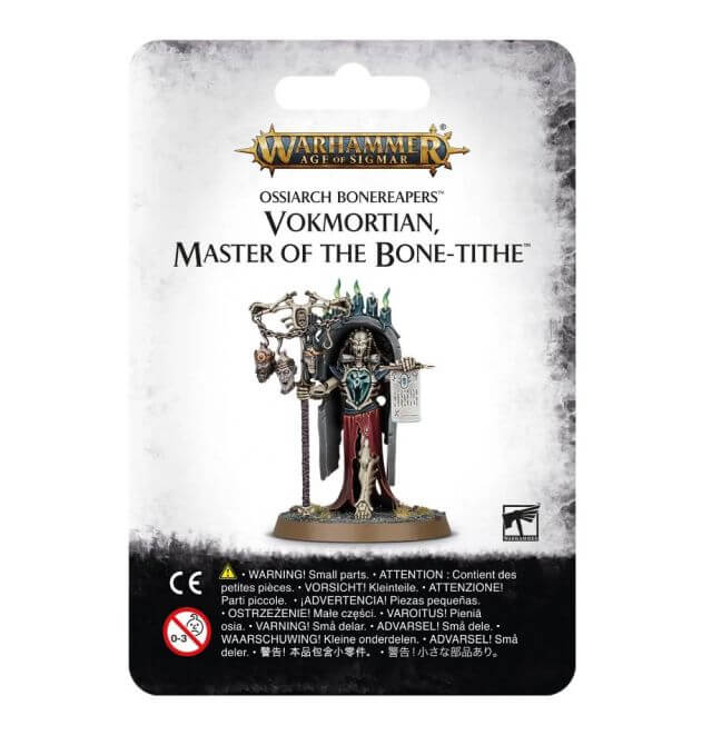 Packaging for Ossiarch Bonereapers Vokmortian, Master of the Bone-tithe miniature, featuring the model on a card with game-related collectible components.