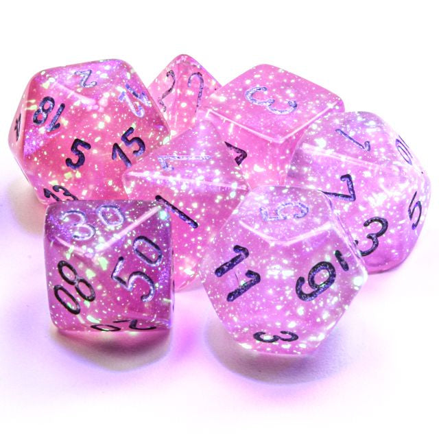 A close up of the Chessex Borealis Pink with Silver polyhedral dice set.
