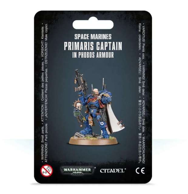 Packaging for Space Marines Primaris Captain in Phobos Armour miniature, featuring the assembled and painted model on a black background with product information.
