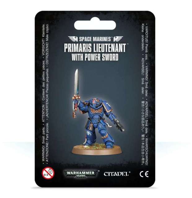 Packaging for Space Marines Primaris Lieutenant with Power Sword miniature, featuring the assembled and painted model on a black background with product information.