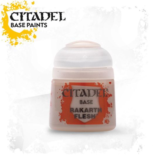 A pot of Citadel Base paint in the color 'Rakarth Flesh'. The product is designed for painting miniatures and is non-toxic, water-based acrylic.