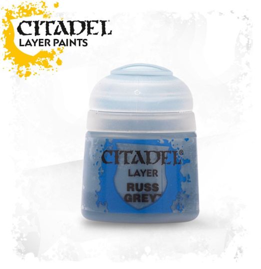 A pot of Citadel Layer paints in the color 'Russ Grey', indicating a rich grey shade suitable for painting miniatures.