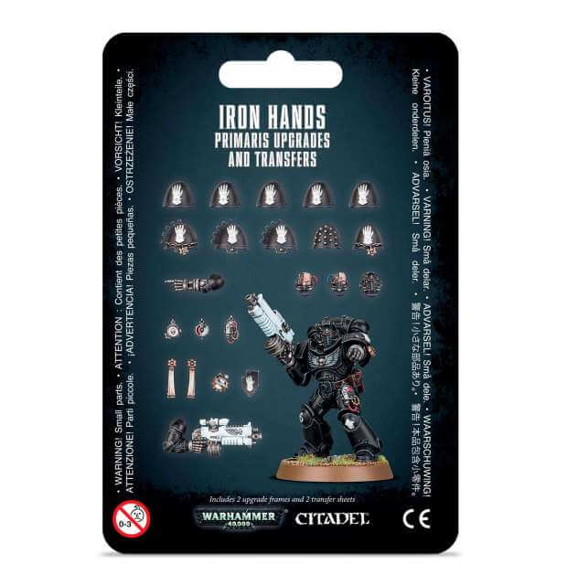 Packaging for Iron Hands Primaris Upgrades & Transfers, displaying various small plastic model pieces for armors and transfers for a Warhammer 40,000 miniature kit.