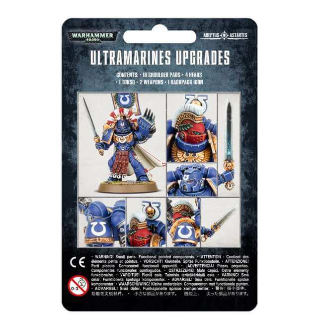 Packaging for Ultramarines upgrades kit showing various components including shoulder pads, heads, helmets, and weapons.