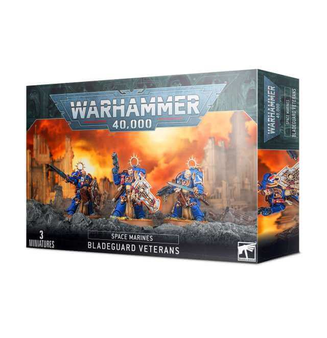 Boxed Warhammer 40,000 Space Marines Bladeguard Veterans miniatures with illustrations of the characters on the front, including a sergeant and multiple variants of heads and equipment.