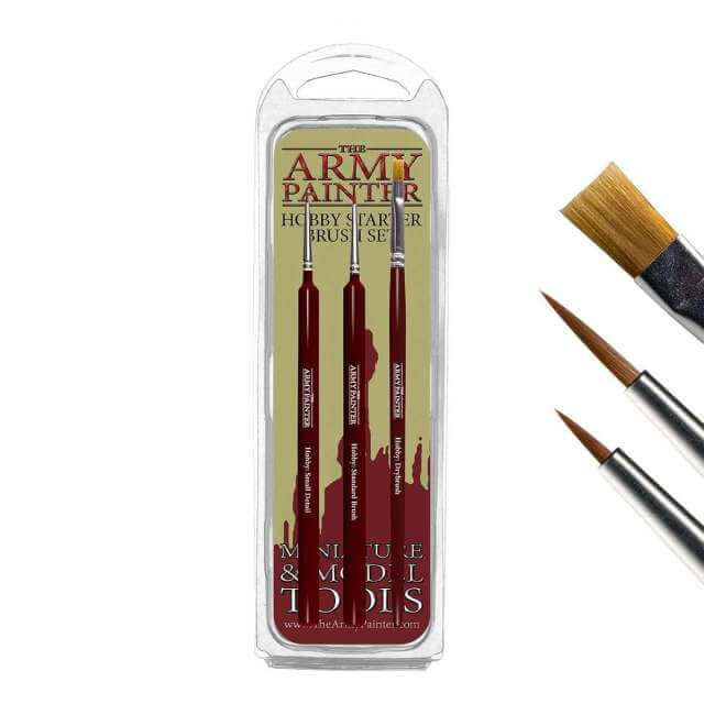 A set of three paint brushes in packaging, labeled for hobby use by Army Painter. The brushes are designed for base coating, drybrushing, and adding small details to miniatures.