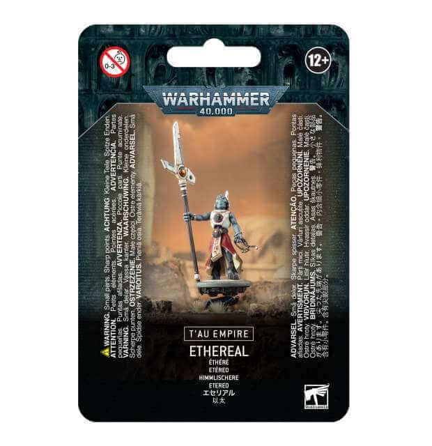 Packaging for Warhammer Tau Empire Ethereal miniature, featuring the assembled and painted model on a card with product information.