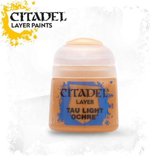 A pot of Citadel Layer paints in the color Tau Light Ochre, primarily designed for painting miniatures.
