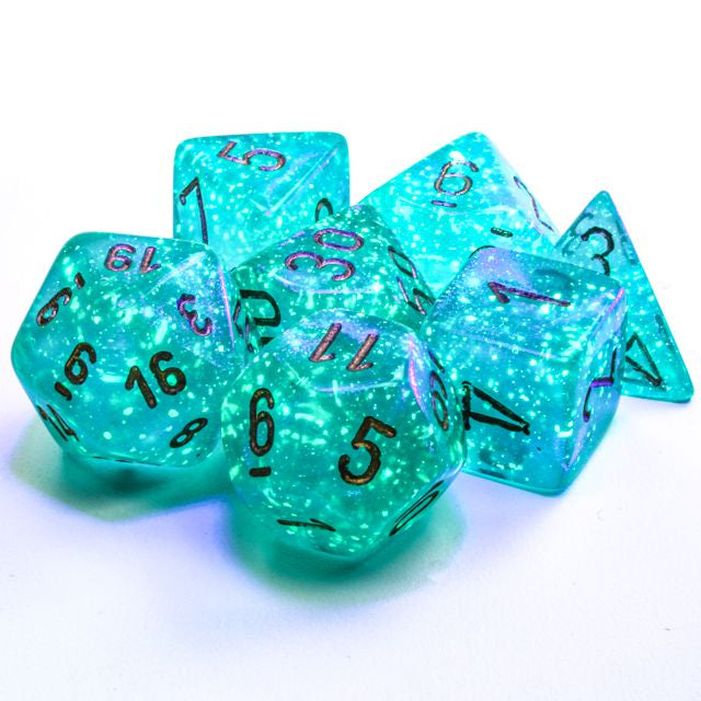 A close up of the Chessex Borealis Teal with gold polyhedral set.