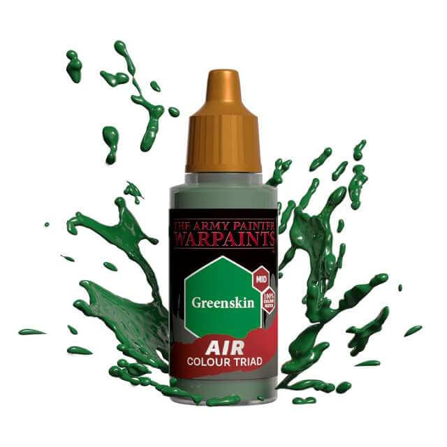 Bottle of Army Painter Airbrush paint Greenskin, showing a splash of paint highlighting the color. 