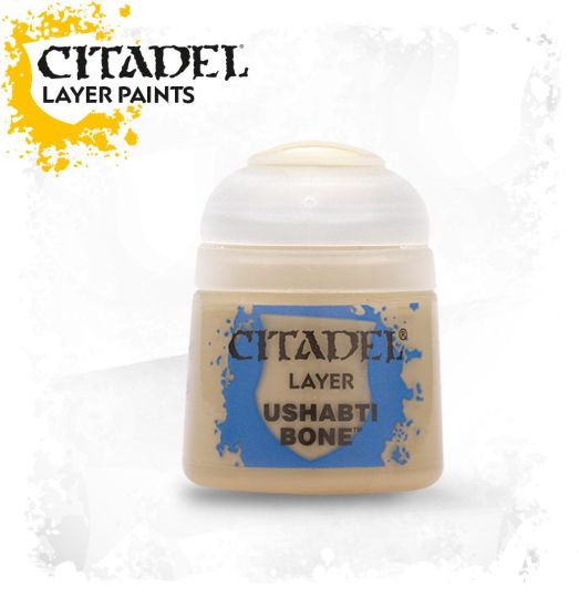 A pot of Citadel Layer paints in the color 'Ushabti Bone'. The product is designed for painting miniatures and provides a range of colors for detailed model painting.