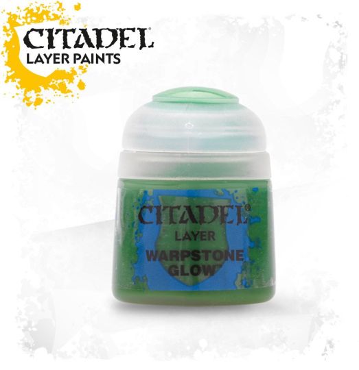 A pot of Citadel Layer paints in the color 'Warpstone Glow', designed for miniature model painting.