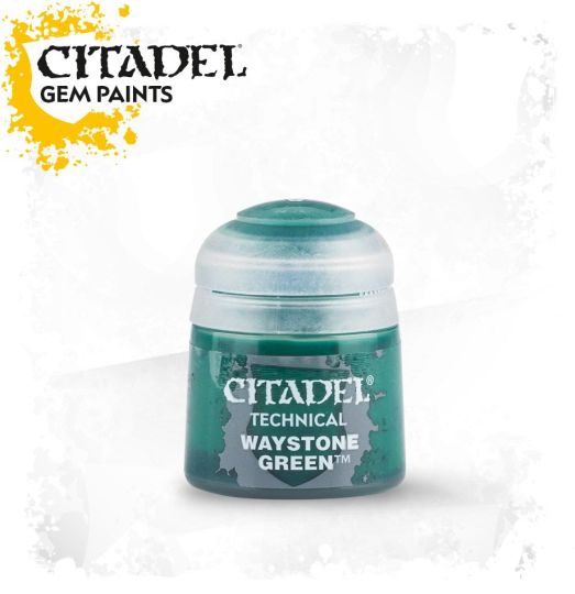 A pot of Citadel Technical paint in Waystone Green color, used for model painting.