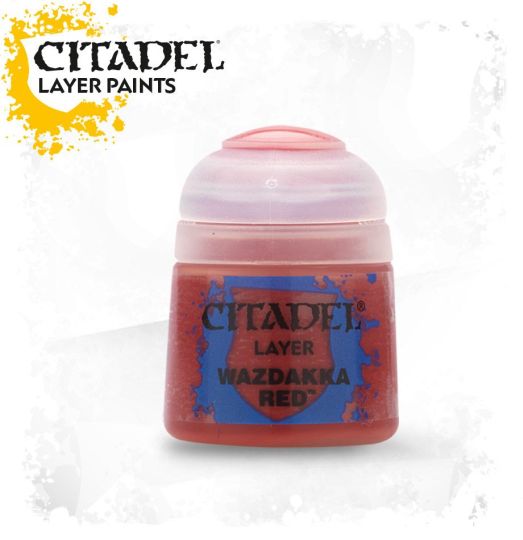 A pot of Citadel Layer Paints labeled 'Wazdakka Red' with a red cap and blue label, against a white background.