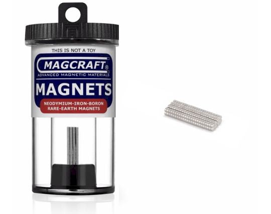 A container of MagCraft rare earth disc magnets, with the container label showing the brand and product type. A small selection of the magnets are displayed outside the container.