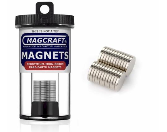 A container of MagCraft rare earth disc magnets, showing the container label and several nickel-plated magnets outside.